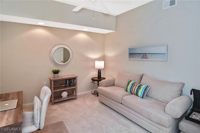 living room featuring ceiling fan and carpet floors