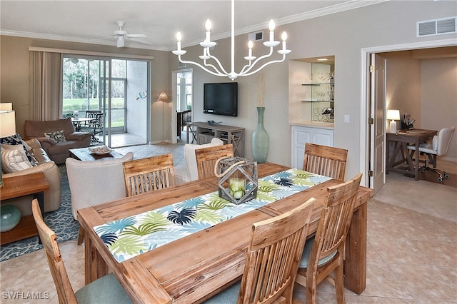 tiled dining area with crown molding and ceiling fan with notable chandelier