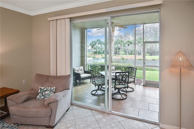 doorway to outside with a healthy amount of sunlight, light tile patterned floors, and crown molding