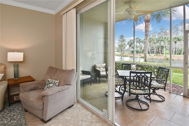 sunroom with ceiling fan