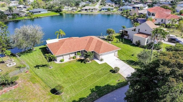 drone / aerial view with a water view