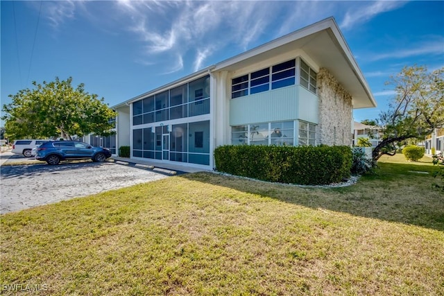 view of property exterior featuring a yard