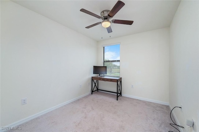 carpeted empty room with ceiling fan