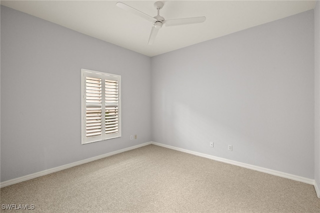 empty room featuring ceiling fan and carpet floors