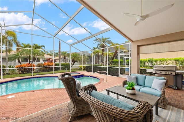 view of pool with grilling area, a patio, glass enclosure, and an in ground hot tub