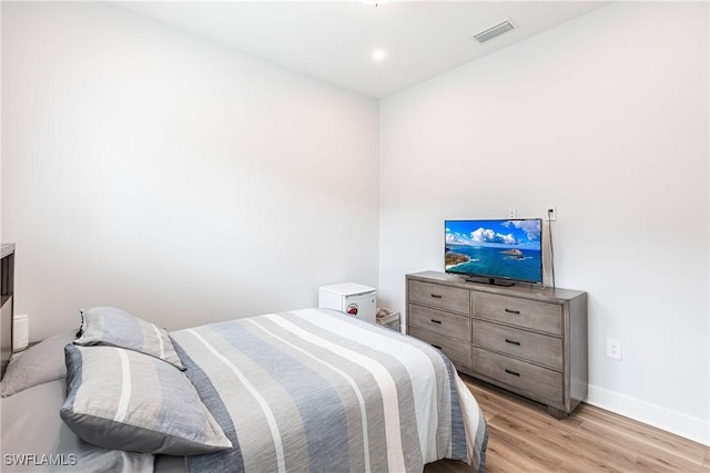 bedroom featuring light hardwood / wood-style flooring