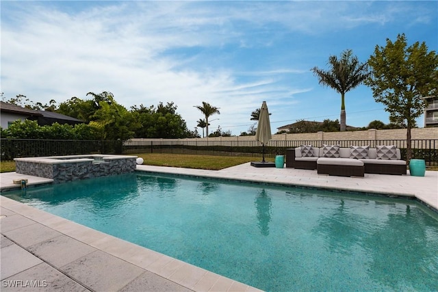 view of swimming pool featuring an outdoor hangout area, a patio, and an in ground hot tub