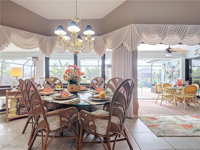 dining area with an inviting chandelier and tile patterned flooring