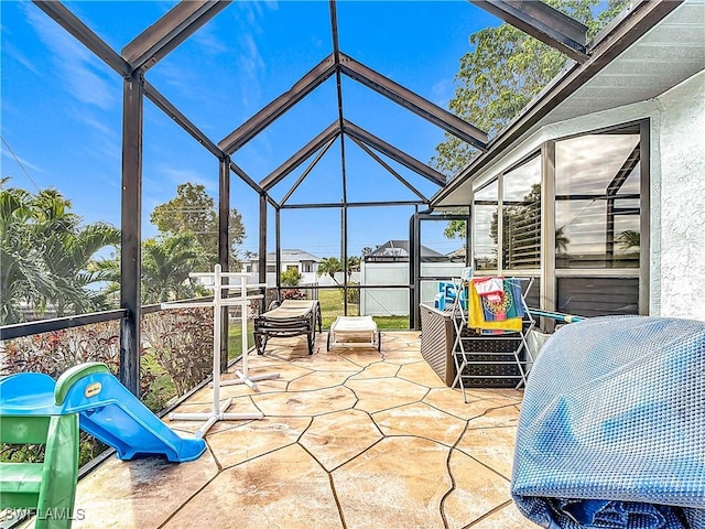 view of patio / terrace with glass enclosure