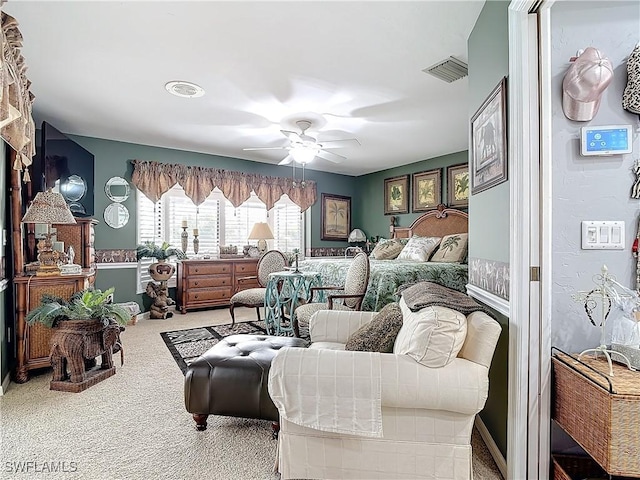 carpeted bedroom with ceiling fan