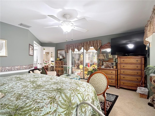 bedroom with ceiling fan and light colored carpet