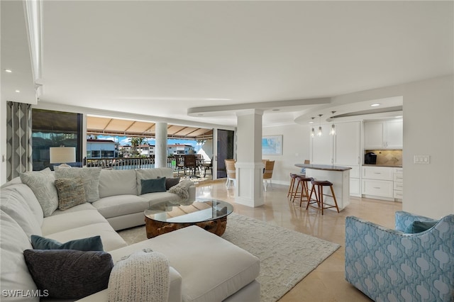 living room featuring light tile patterned flooring