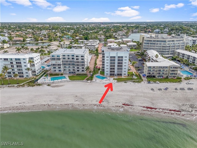 aerial view with a view of the beach and a water view