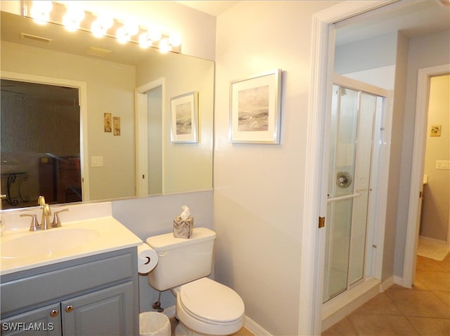 bathroom with a shower with shower door, tile patterned floors, toilet, and vanity