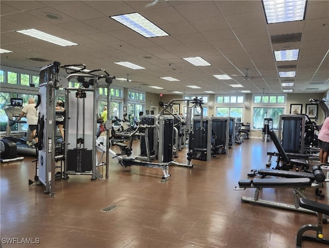 workout area featuring a drop ceiling