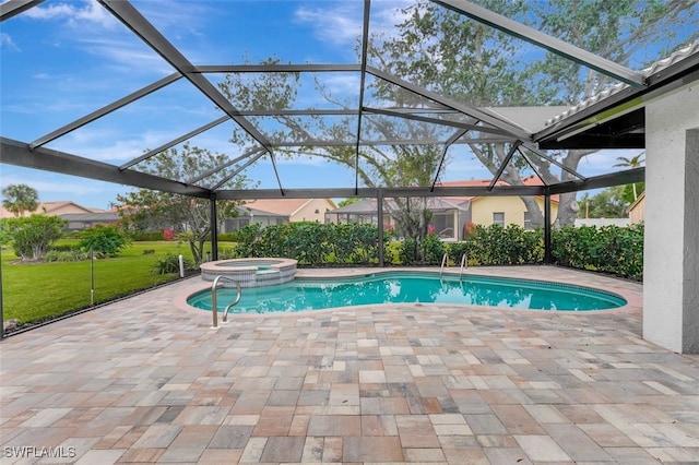 view of pool with glass enclosure, a patio, a yard, and a pool with connected hot tub