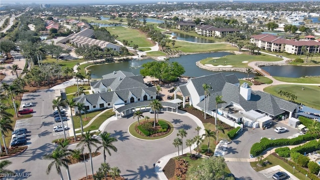 bird's eye view featuring a residential view, a water view, and golf course view