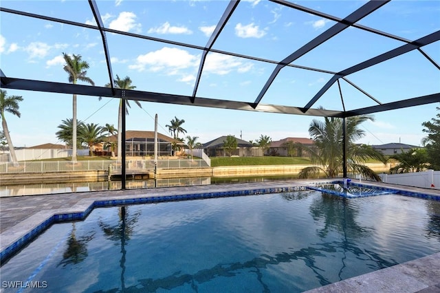 view of pool with a lanai and pool water feature