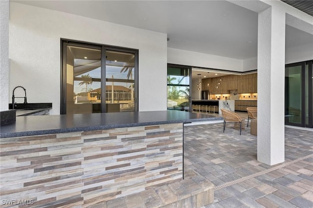 view of patio with a wet bar