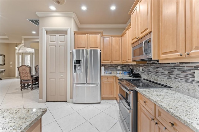 kitchen featuring light brown cabinetry, light tile patterned flooring, crown molding, and stainless steel appliances