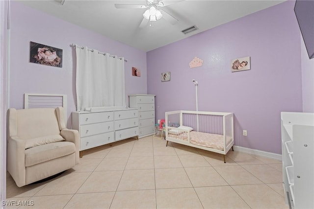 bedroom featuring ceiling fan and light tile patterned floors