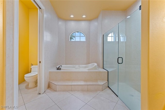 bathroom with toilet, independent shower and bath, and tile patterned floors