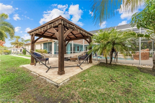 exterior space with a lanai, a lawn, and a patio area