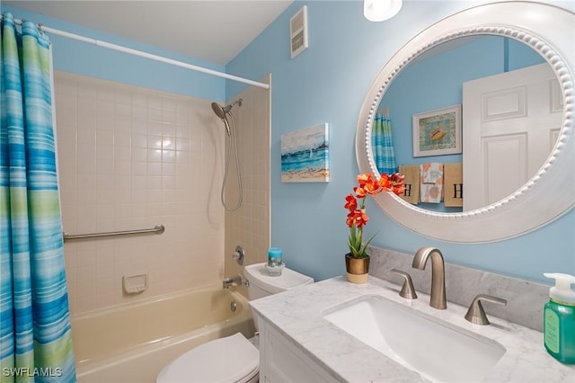 full bathroom featuring vanity, toilet, and shower / bath combo with shower curtain