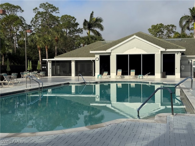 view of swimming pool with a patio