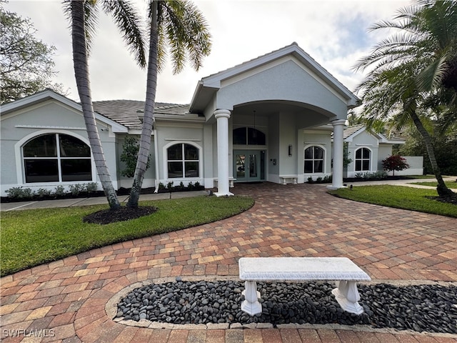 view of front facade featuring french doors