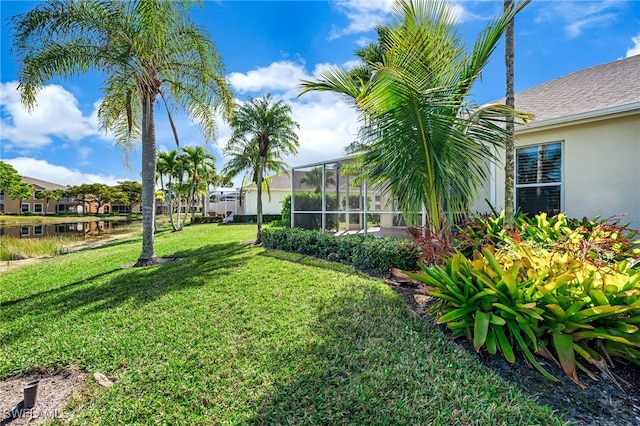 view of yard with a lanai