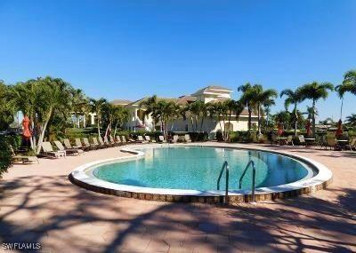 community pool with a patio