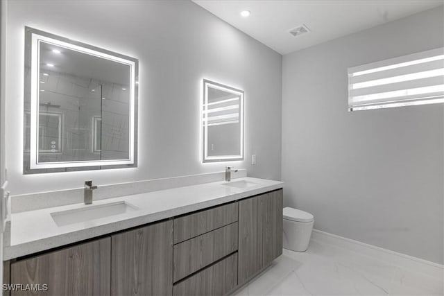 bathroom with toilet, vanity, and a shower