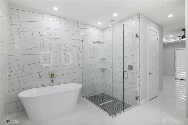 bathroom with ceiling fan and independent shower and bath