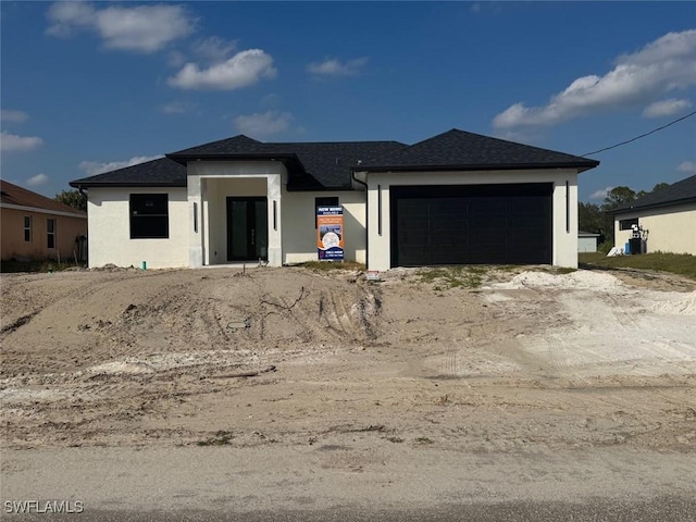 prairie-style house with a garage