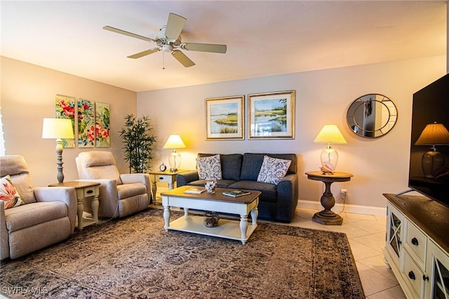 living room with ceiling fan and light tile patterned floors