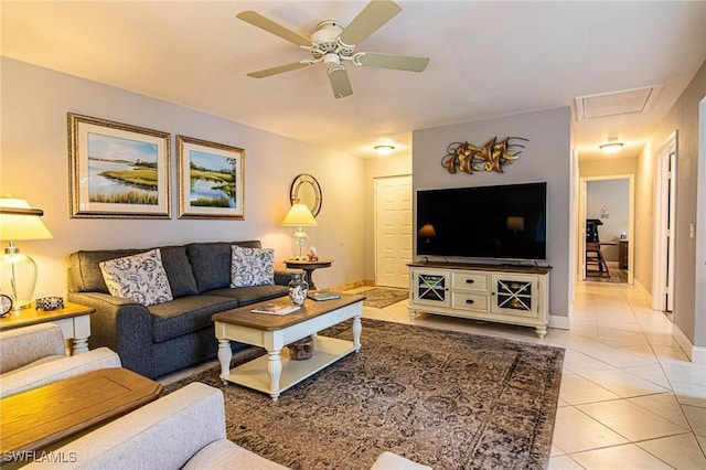 living room featuring ceiling fan and light tile patterned floors