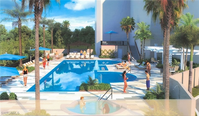 6573 Marissa Loop Unit 2004, Naples, FL 34108 - community pool featuring a patio area
