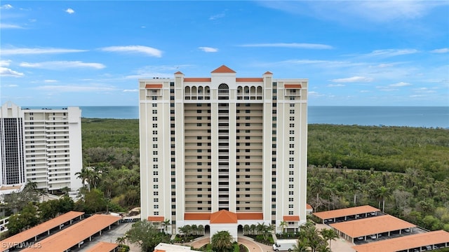 view of building exterior with a water view