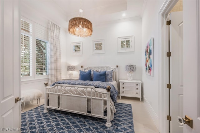 bedroom with crown molding