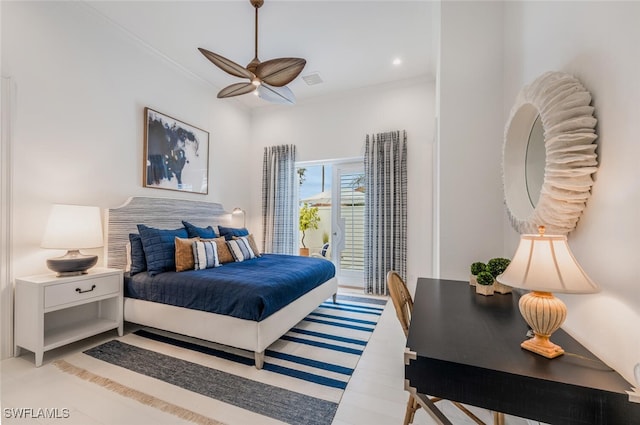 bedroom with ceiling fan and ornamental molding