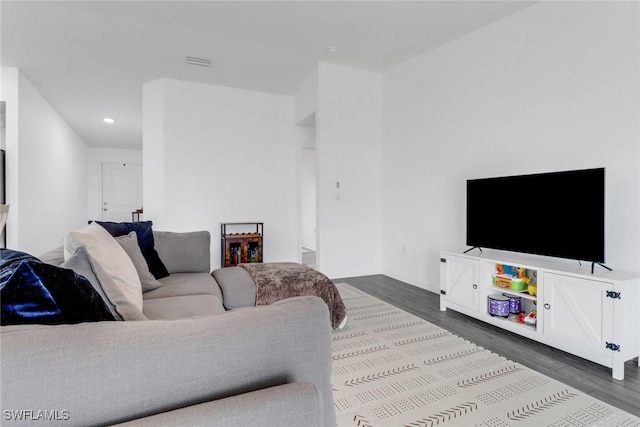 living room with dark wood-type flooring