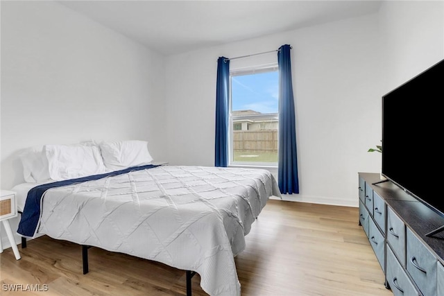 bedroom featuring light wood-type flooring