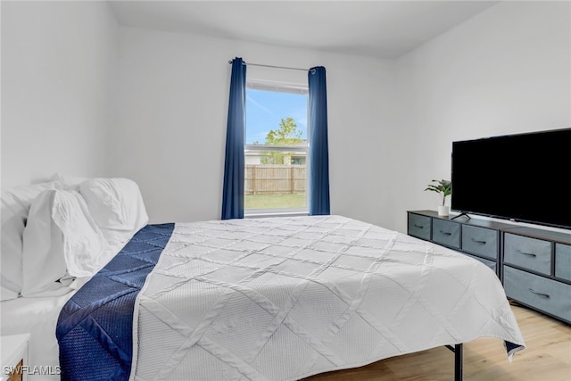 bedroom featuring hardwood / wood-style flooring