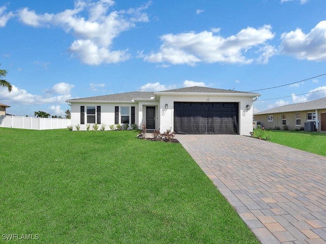 ranch-style home featuring central AC, a garage, and a front yard