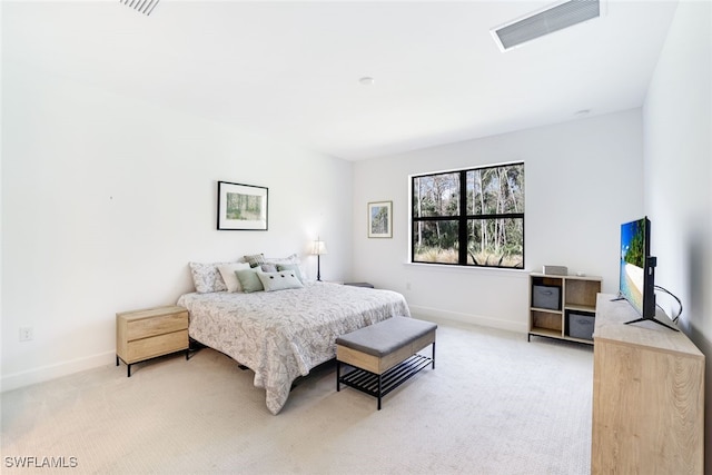 bedroom with light carpet