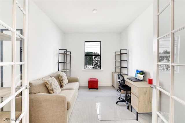 office space featuring light colored carpet and french doors