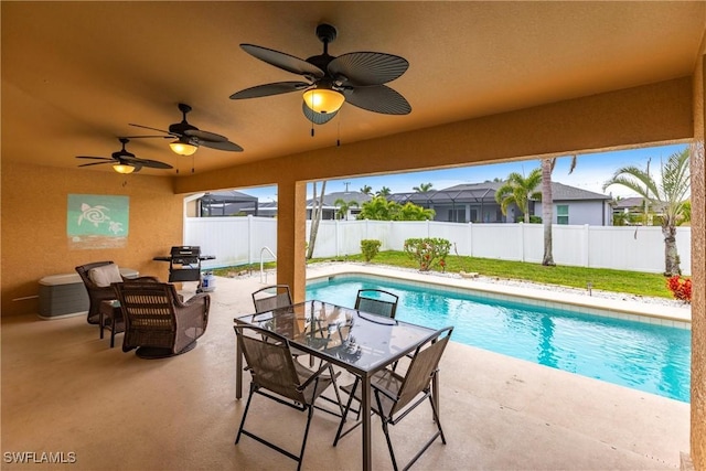 view of pool featuring ceiling fan, grilling area, and a patio