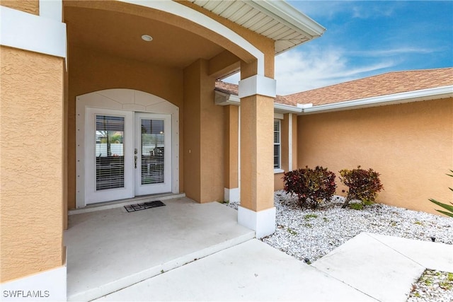 doorway to property featuring a patio