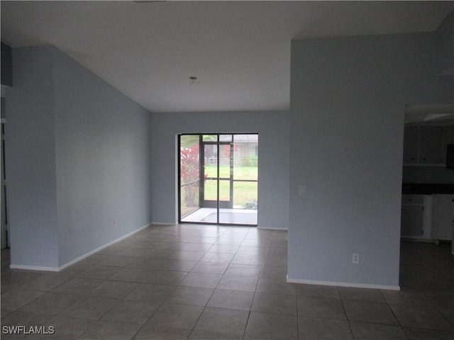 view of tiled spare room